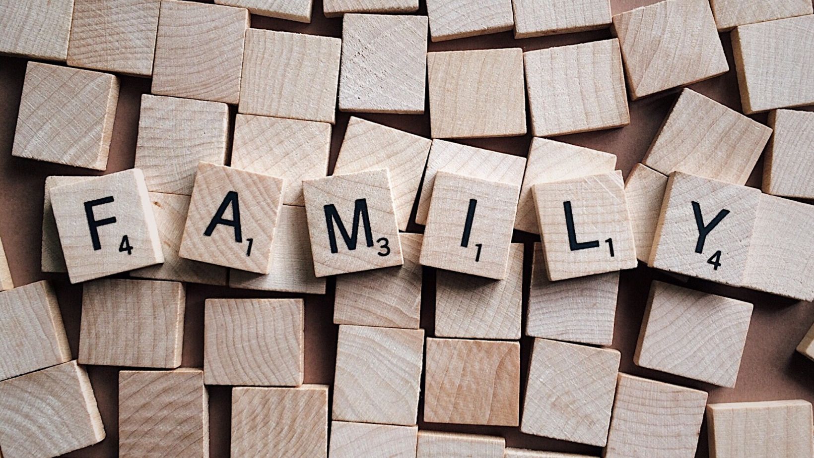 Scrabble tiles spelling the word family